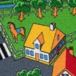 Close-up of play carpet showing a house and a horse.