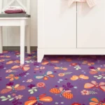 Purple kids' carpet with colorful butterflies and flowers.