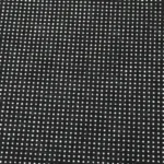 Close-up texture of black anti-slip rug backing material