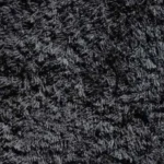 Close-up texture of dark charcoal shag carpet material