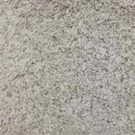 Close-up texture of soft light grey shag carpet fabric