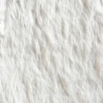 Close-up texture of soft white fluffy faux fur carpet