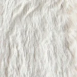 Soft off-white fluffy faux fur texture background view