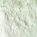 Detailed close-up view of a soft white faux fur texture